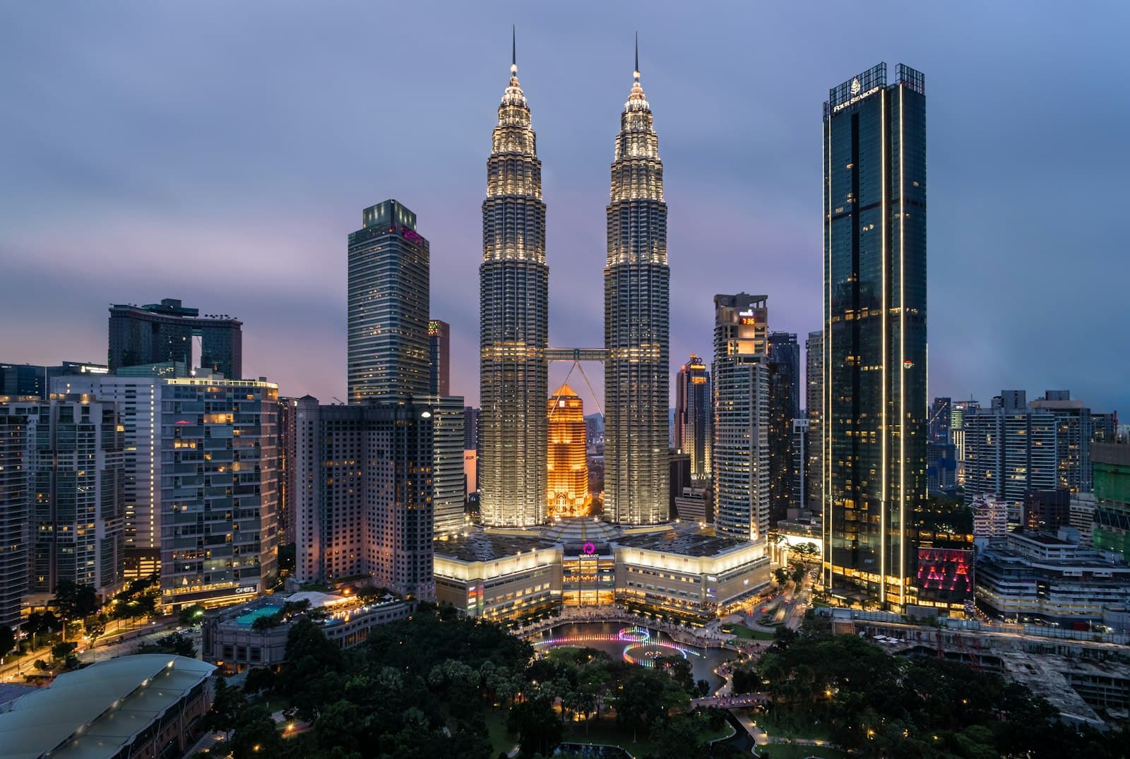 Petronas Towers and the Kuala Lumpur skyline at dusk